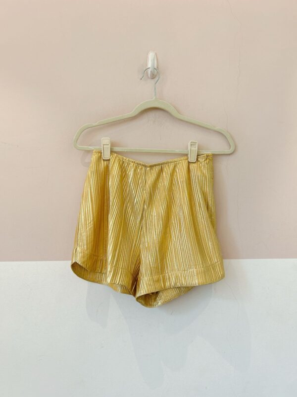 Short plissado dourado Eugenia Sanson P