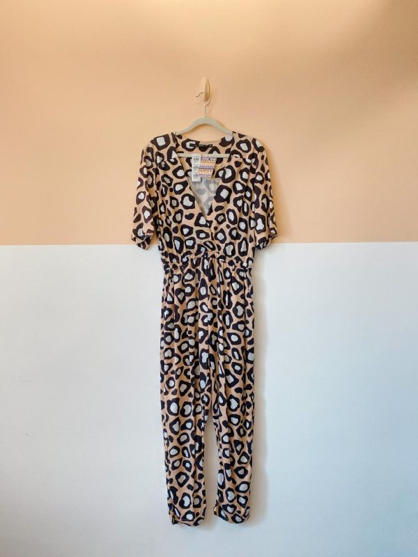 Macacão oncinha bege Eva 36